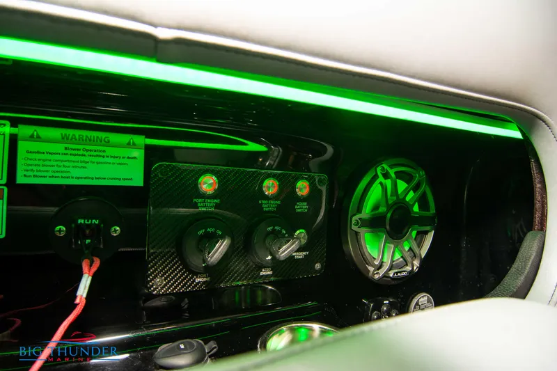  Yacht Photos Pics Control panel and speaker of 2020 Donzi 38 ZRC boat with green LED lighting.