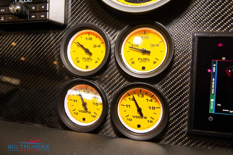  Yacht Photos Pics Close-up of 2020 Donzi 38 ZRC dashboard gauges, including fuel and voltage meters.