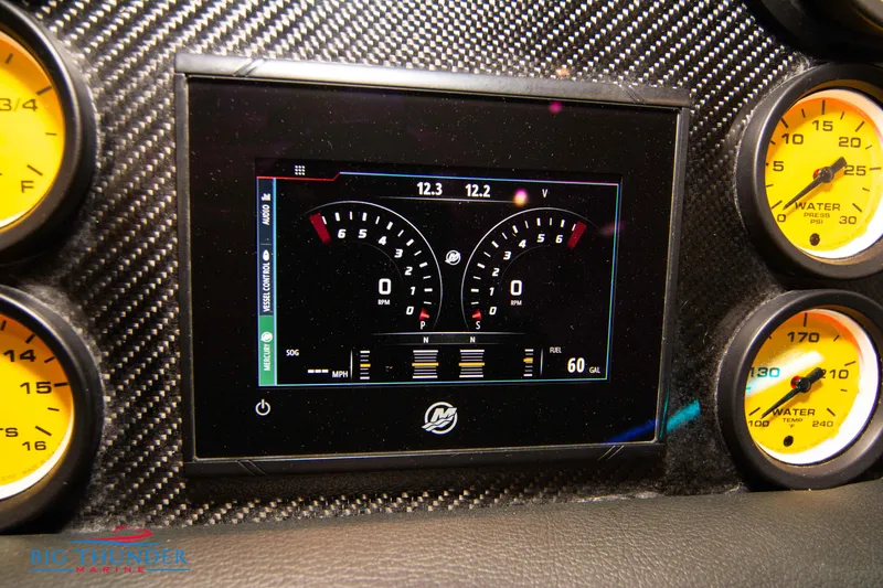  Yacht Photos Pics Dashboard of a 2020 Donzi 38 ZRC with digital and analog gauges.