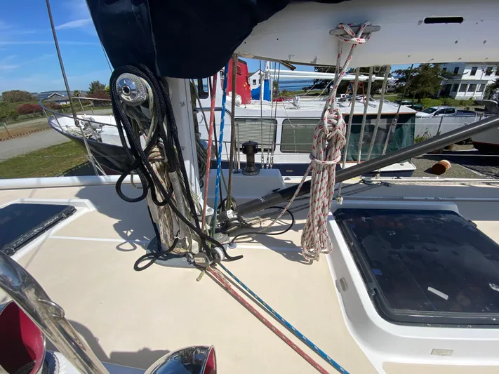 Foxy Yacht Photos Pics Sundeer 56 sailboat deck with ropes and equipment, 1995 model, docked in a marina.