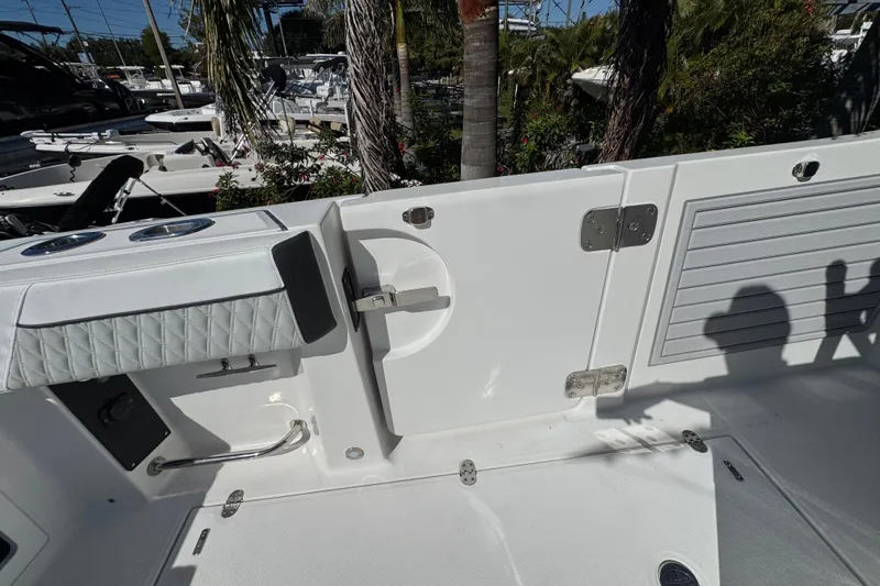  Yacht Photos Pics 2021 Blackfin 332 CC boat interior with seating and storage compartments.