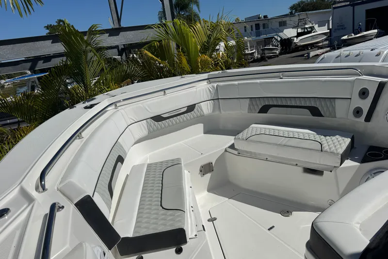  Yacht Photos Pics 2021 Blackfin 332 CC boat interior with white seating and modern design.