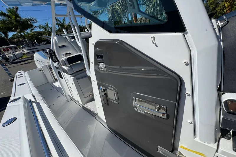  Yacht Photos Pics 2021 Blackfin 332 CC boat interior with sleek seating and modern design elements.