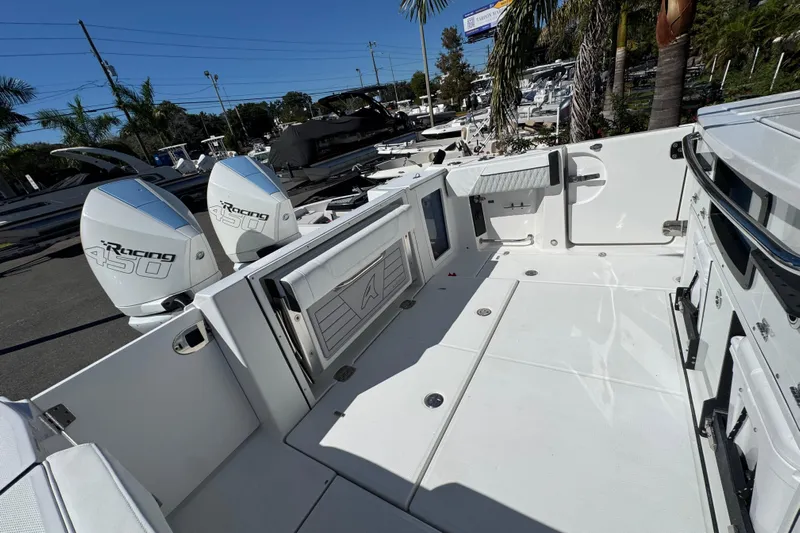  Yacht Photos Pics 2021 Blackfin 332 CC boat with twin Racing 450 engines, spacious deck, and modern design.