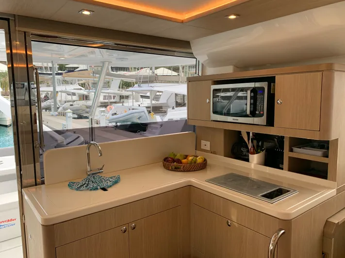 Life Settling Yacht Photos Pics Interior of 2022 Aquila 44 Yacht featuring modern kitchen.