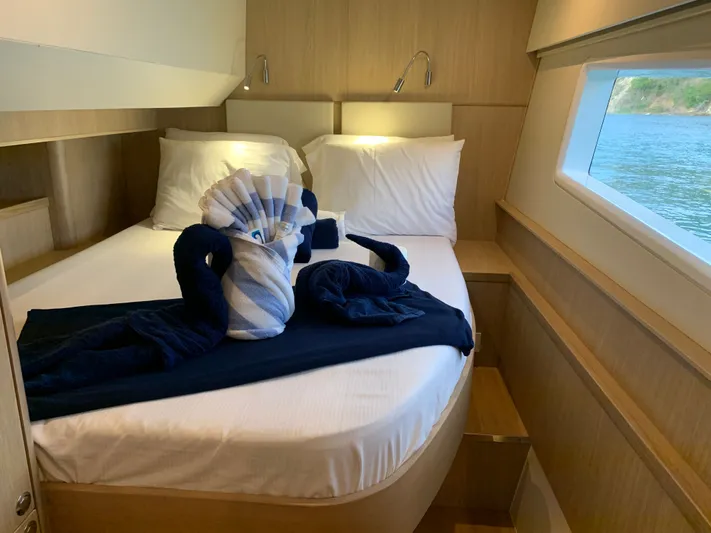 Life Settling Yacht Photos Pics Interior of 2022 Aquila 44 Yacht with elegant bedroom.