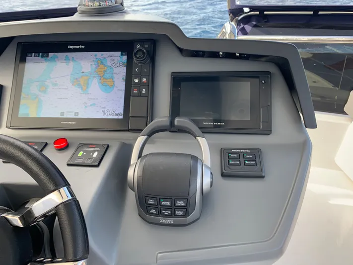 Life Settling Yacht Photos Pics Aquila 44 Yacht 2022 helm with navigation system.
