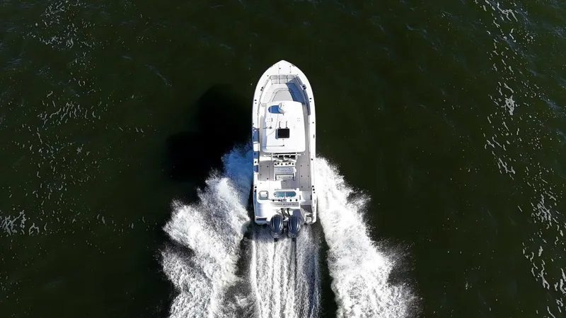  Yacht Photos Pics Aerial view of 2022 Sea Fox 288 Commander boat cruising on open water.
