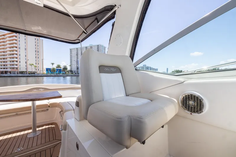 Pura Vida Yacht Photos Pics Luxurious interior of 2012 Sea Ray 370 Sundancer yacht with comfortable seating.