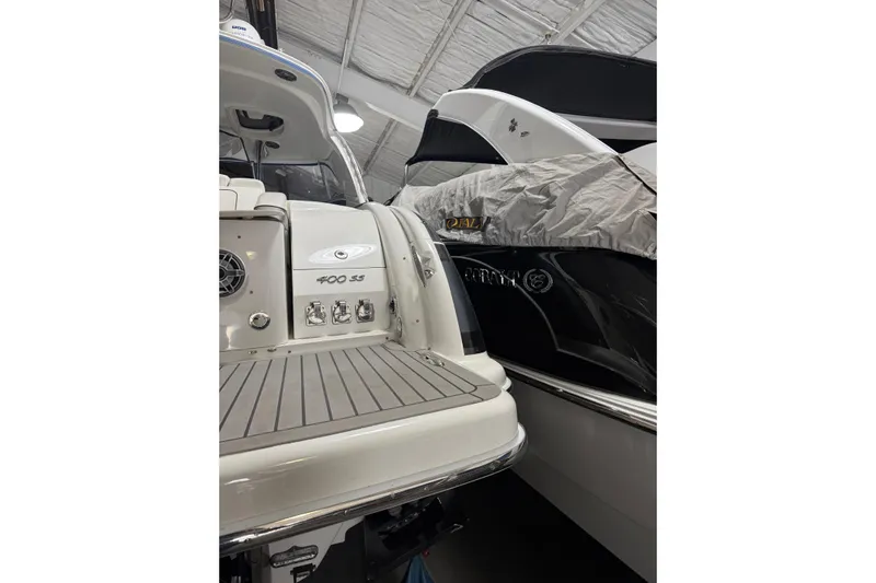  Yacht Photos Pics 2018 Formula 400 Super Sport boat in storage, showcasing rear deck and branding.