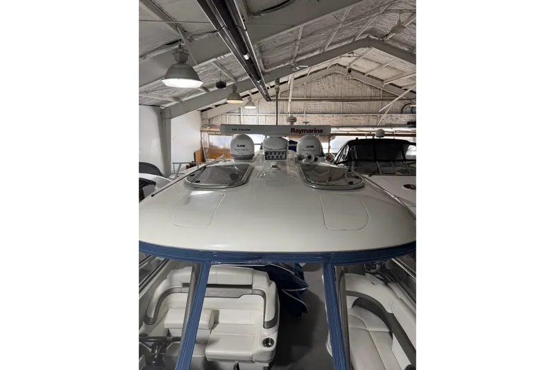  Yacht Photos Pics 2018 Formula 400 Super Sport boat in a storage facility, showcasing sleek design and advanced equipment.