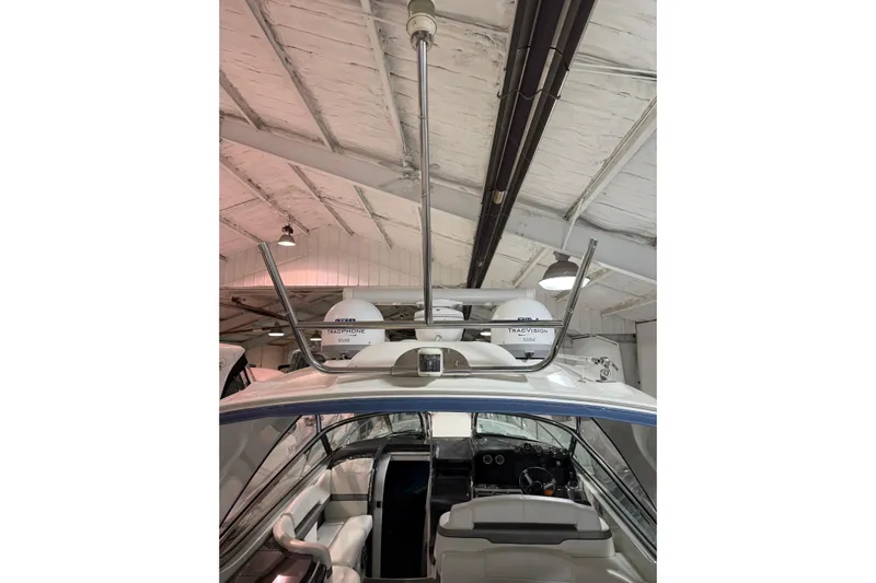  Yacht Photos Pics 2018 Formula 400 Super Sport boat interior with radar equipment in a storage facility.