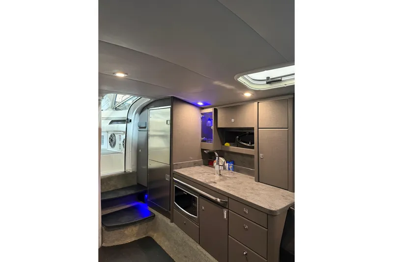  Yacht Photos Pics 2018 Formula 400 Super Sport yacht interior with modern kitchen and sleek cabinetry.