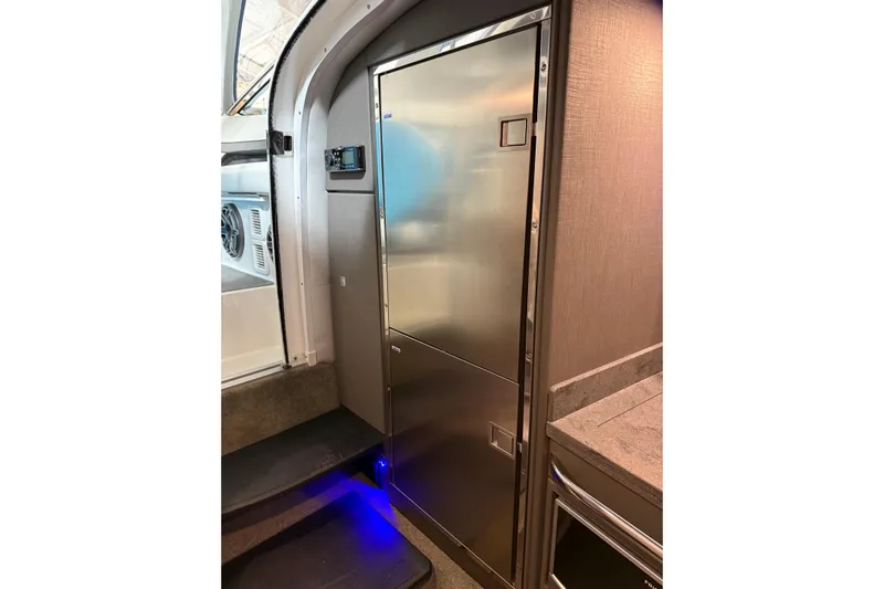  Yacht Photos Pics 2018 Formula 400 Super Sport yacht interior with stainless steel refrigerator and modern design.