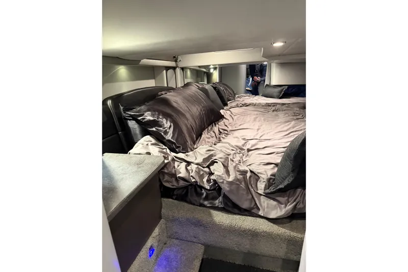  Yacht Photos Pics Luxurious cabin interior of 2018 Formula 400 Super Sport with plush bedding and ambient lighting.