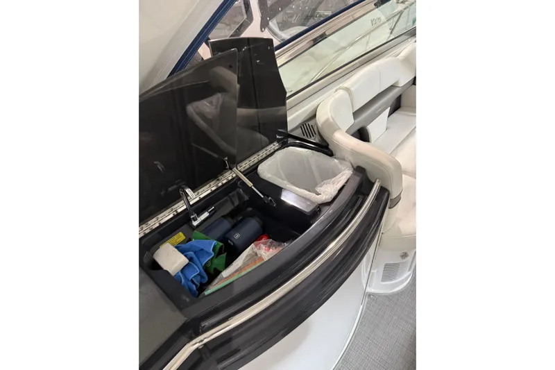  Yacht Photos Pics Interior of 2018 Formula 400 Super Sport boat with open storage compartment.