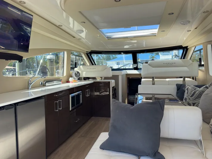Going Coastal Yacht Photos Pics Luxurious interior of a 2019 Carver C43 Coupe yacht with modern amenities and seating.