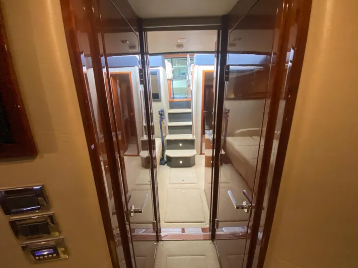  Yacht Photos Pics Interior view of 2015 Sea Ray 470 Sundancer yacht with polished wood finishes.