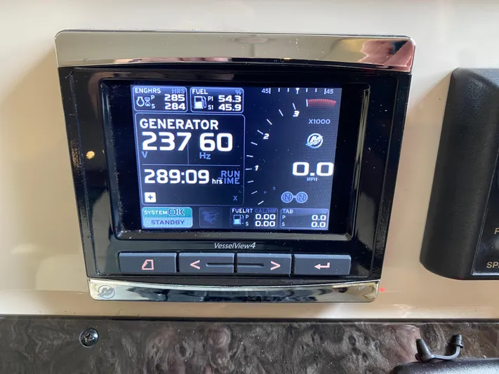  Yacht Photos Pics Display panel of a 2015 Sea Ray 470 Sundancer showing generator and engine data.