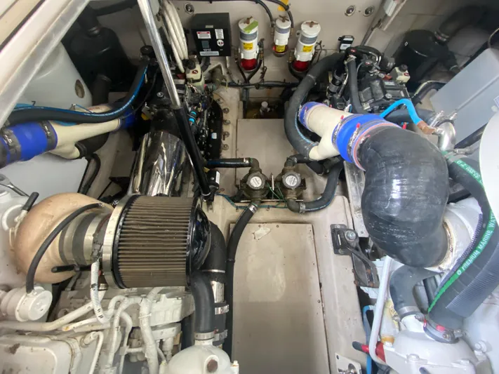  Yacht Photos Pics Engine compartment of 2015 Sea Ray 470 Sundancer with visible components and hoses.
