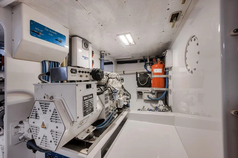 Rose Yacht Photos Pics Engine room of 1998 Rybovich Convertible yacht, featuring machinery and equipment.