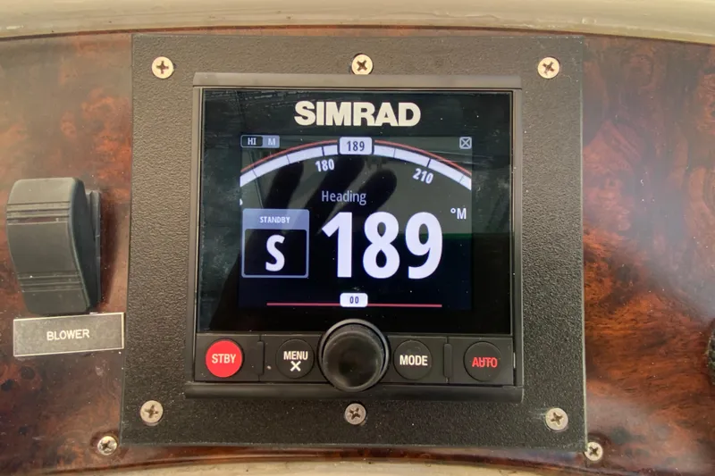 Island Time Yacht Photos Pics Simrad navigation display on 2000 Riviera 4000 boat dashboard showing heading 189.