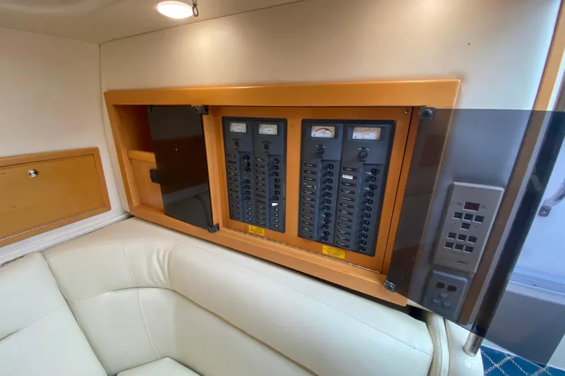 Island Time Yacht Photos Pics Electrical panel inside 2000 Riviera 4000 yacht, featuring control switches and meters.