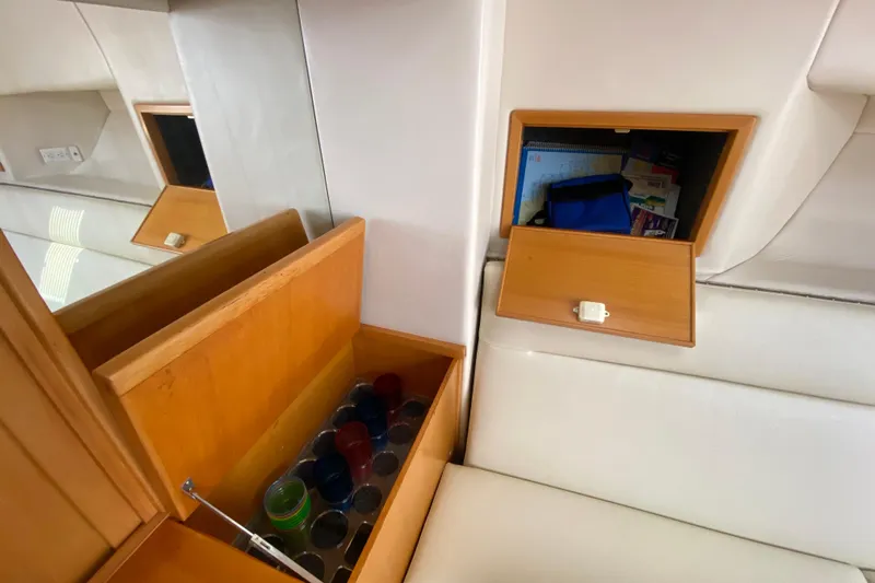 Island Time Yacht Photos Pics Interior of 2000 Riviera 4000 yacht with wooden storage compartments.