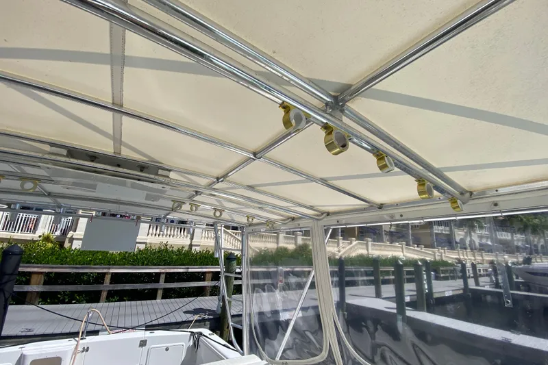 Island Time Yacht Photos Pics Interior view of a 2000 Riviera 4000 boat canopy with metal framework.