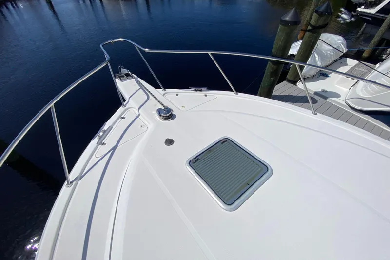 Island Time Yacht Photos Pics Bow view of 2000 Riviera 4000 yacht docked at marina.