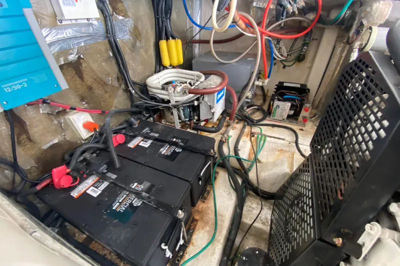 Island Time Yacht Photos Pics Engine room of 2000 Riviera 4000 with batteries and wiring system.