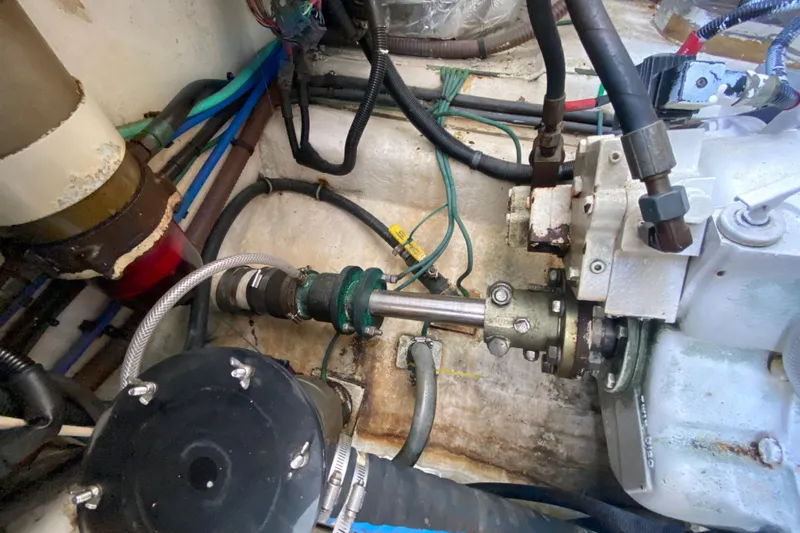 Island Time Yacht Photos Pics Engine compartment of a 2000 Riviera 4000 boat, showing mechanical components and wiring.