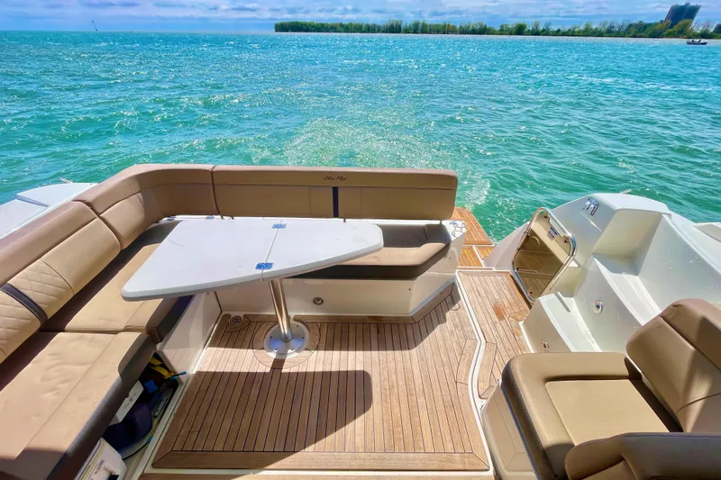  Yacht Photos Pics 2017 Sea Ray Sundancer 400 yacht with elegant seating and table on a sunny day.