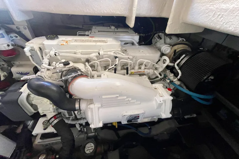  Yacht Photos Pics Engine compartment of a 2017 Sea Ray Sundancer 400, showcasing detailed mechanical components.