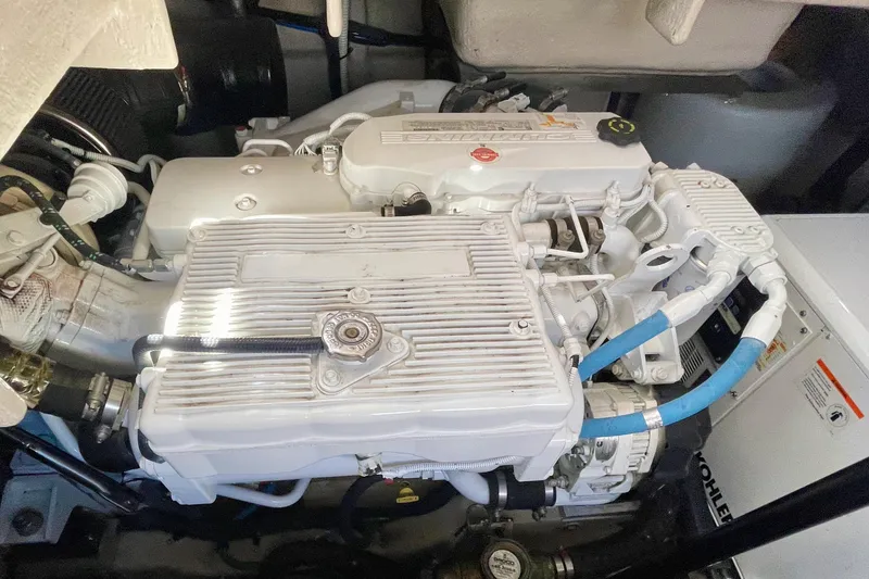  Yacht Photos Pics Engine compartment of a 2017 Sea Ray Sundancer 400, showcasing detailed mechanical components.