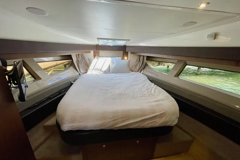  Yacht Photos Pics Luxurious 2017 Sea Ray Sundancer 400 yacht bedroom with elegant bedding and panoramic windows.