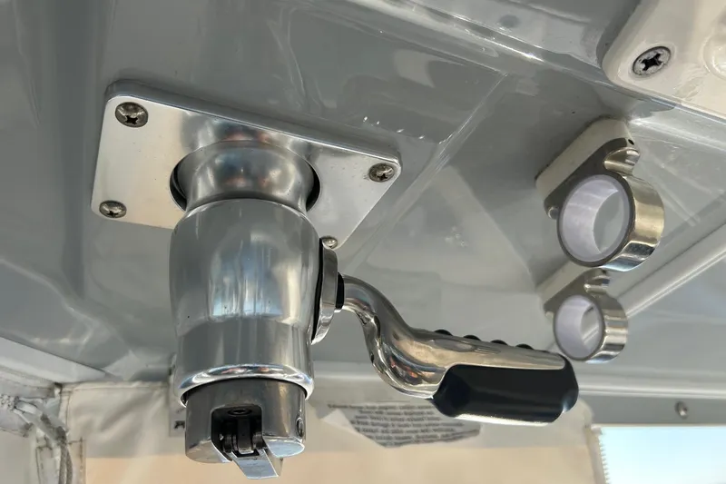  Yacht Photos Pics Close-up of a 2023 Pursuit S 378 Sport boat's metal handle and fixtures.