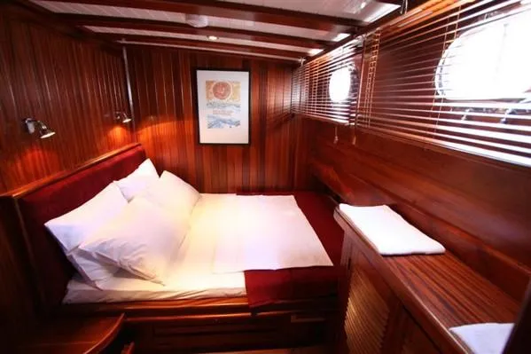 Trİppİn Yacht Photos Pics Luxurious wooden cabin interior of 2006 Custom Wooden Ketch Tirhandil 20M yacht.