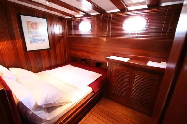 Trİppİn Yacht Photos Pics Luxurious wooden cabin interior of 2006 Custom Wooden Ketch Tirhandil 20M yacht.