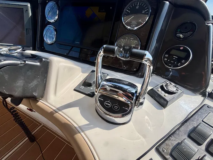  Yacht Photos Pics Control panel of a 2008 Sea Ray 44 Sedan Bridge yacht with throttle and gauges.