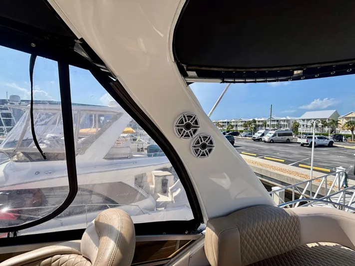  Yacht Photos Pics Interior view of 2008 Sea Ray 44 Sedan Bridge yacht with speakers and seating.