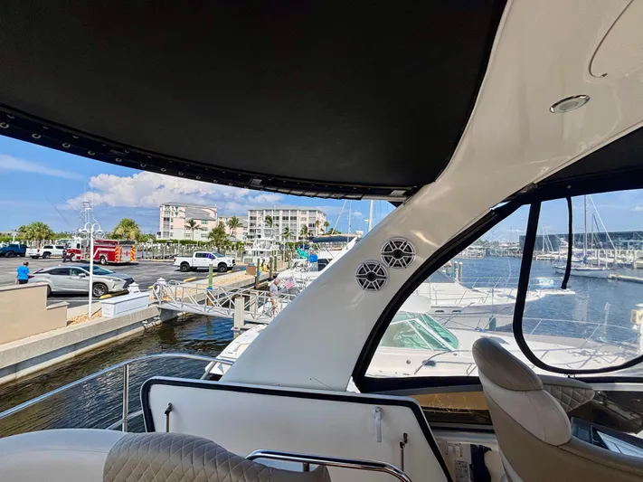  Yacht Photos Pics 2008 Sea Ray 44 Sedan Bridge at marina, showcasing interior and dockside view.