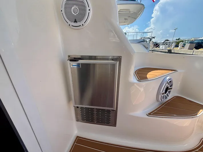  Yacht Photos Pics 2008 Sea Ray 44 Sedan Bridge yacht with stainless steel fridge and marine speaker.