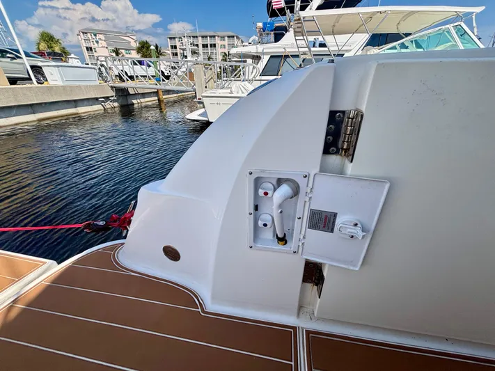  Yacht Photos Pics 2008 Sea Ray 44 Sedan Bridge docked, showing deck and utility connections.
