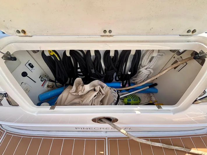  Yacht Photos Pics Storage compartment of 2008 Sea Ray 44 Sedan Bridge with ropes and equipment.