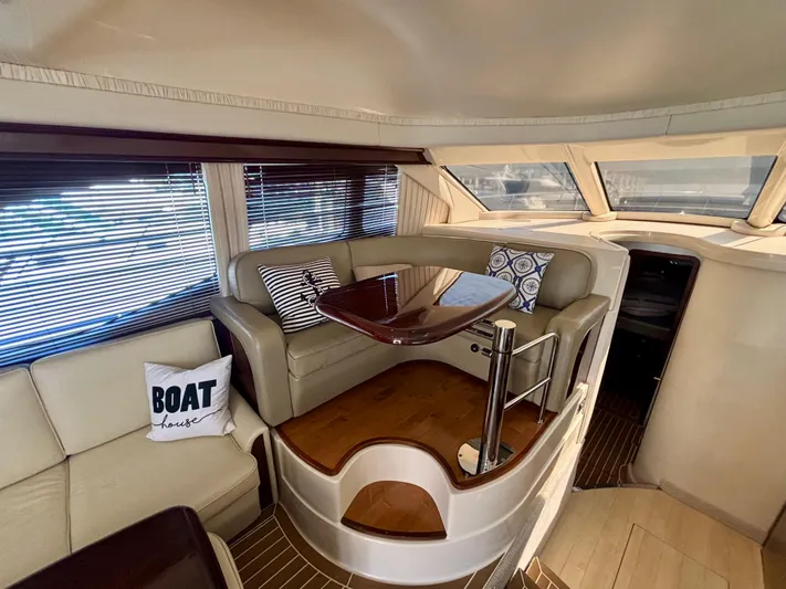  Yacht Photos Pics Luxurious interior of 2008 Sea Ray 44 Sedan Bridge yacht with elegant seating and decor.
