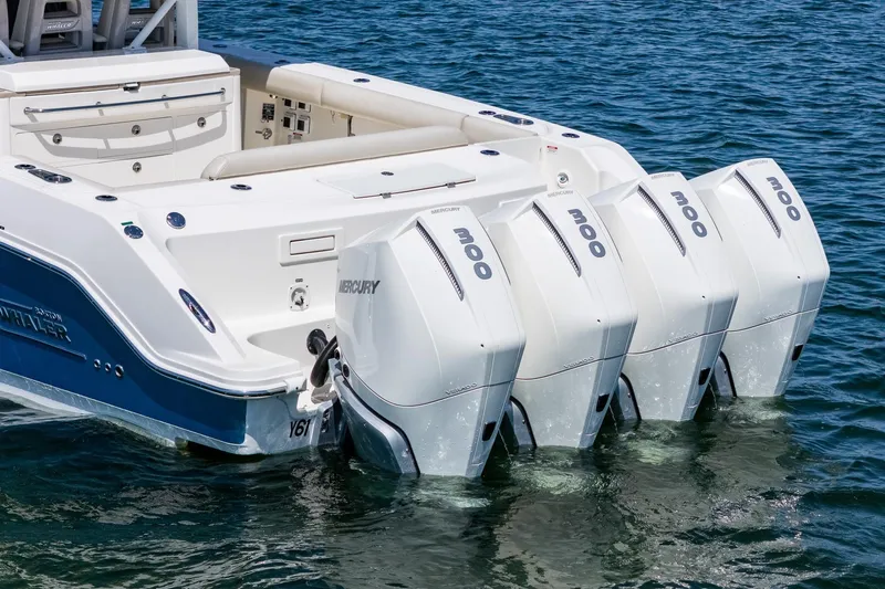  Yacht Photos Pics 2022 Boston Whaler 380 Outrage with four Mercury outboard engines on the water.