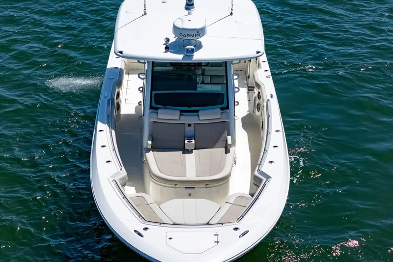  Yacht Photos Pics 2022 Boston Whaler 380 Outrage boat on water, aerial view.