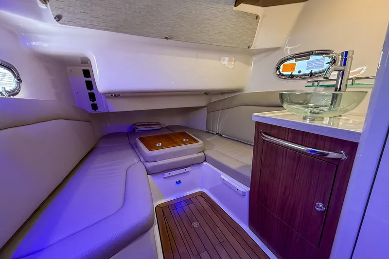 Yacht Photos Pics Luxurious interior of 2022 Boston Whaler 380 Outrage with modern seating and glass sink.