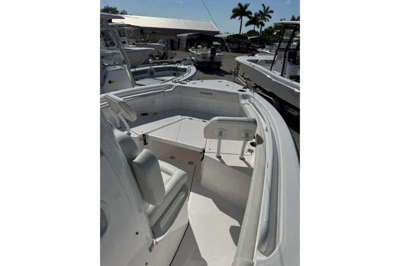  Yacht Photos Pics 2024 Everglades 235 Center Console boat interior with seating and console view.